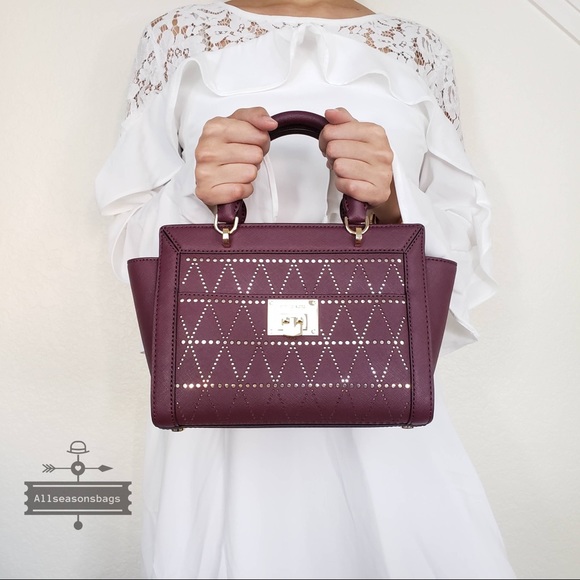 Michael Kors Handbags - NWT Michael Kors Tina Small messenger plum satchel